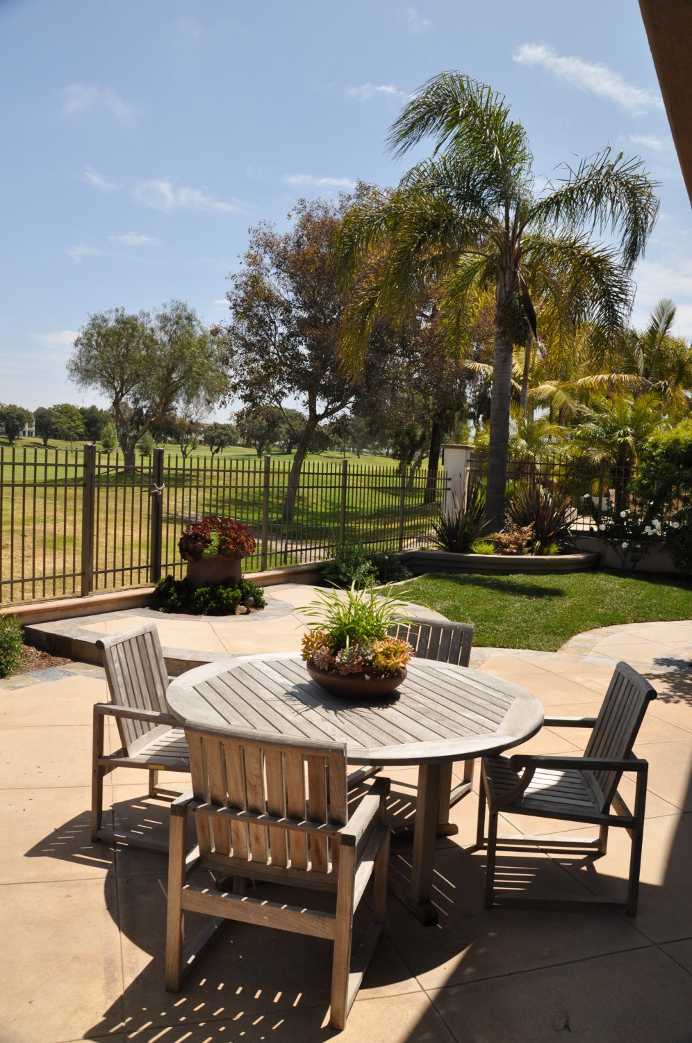 Teak Furniture and Golf Course View